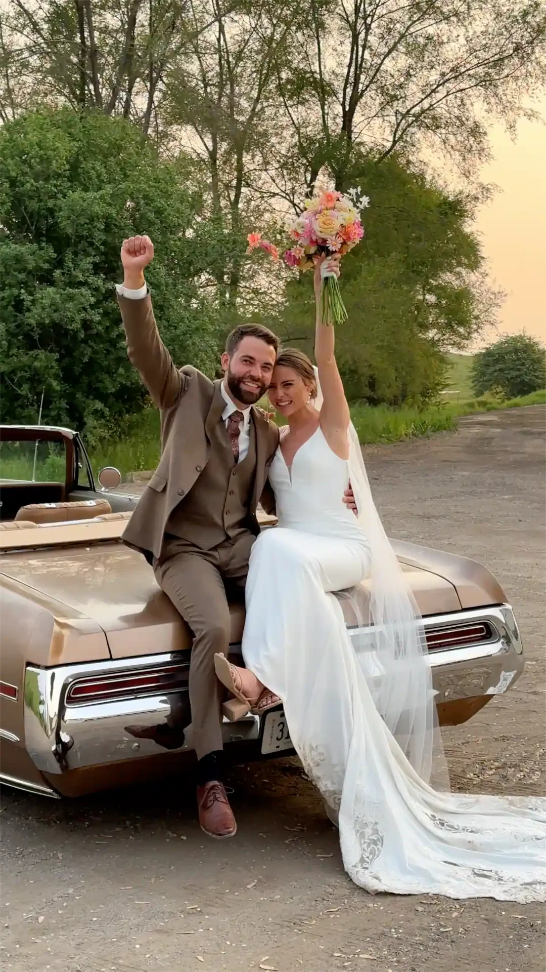 wedding couple cheering